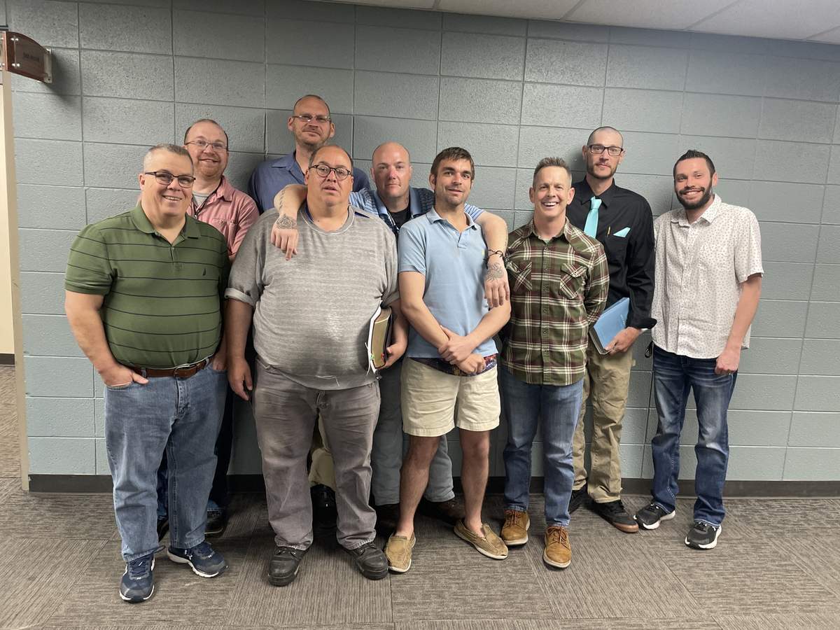 The first six men accepted into the Metamorphosis program with their teachers Gary, Tim, and Nate